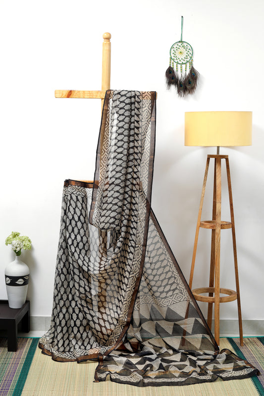 Black kota doria saree with beige prints and a rust gold
