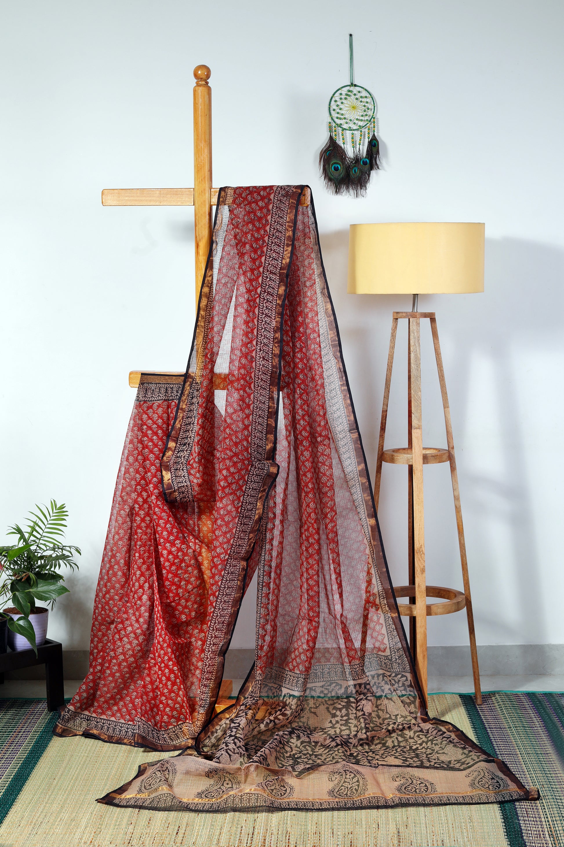 brick red  saree with black border