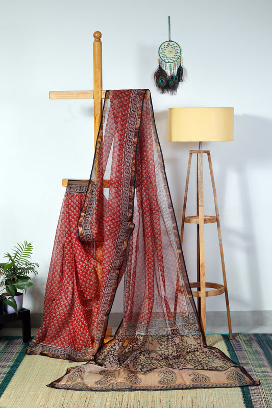 brick red  saree with black border