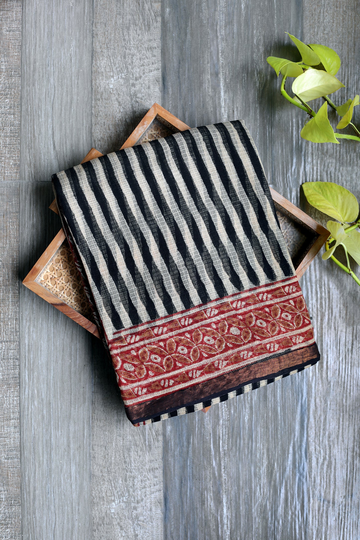 Kota Doria Bagru - beige saree with thick black vertical lines with a red border and black zari