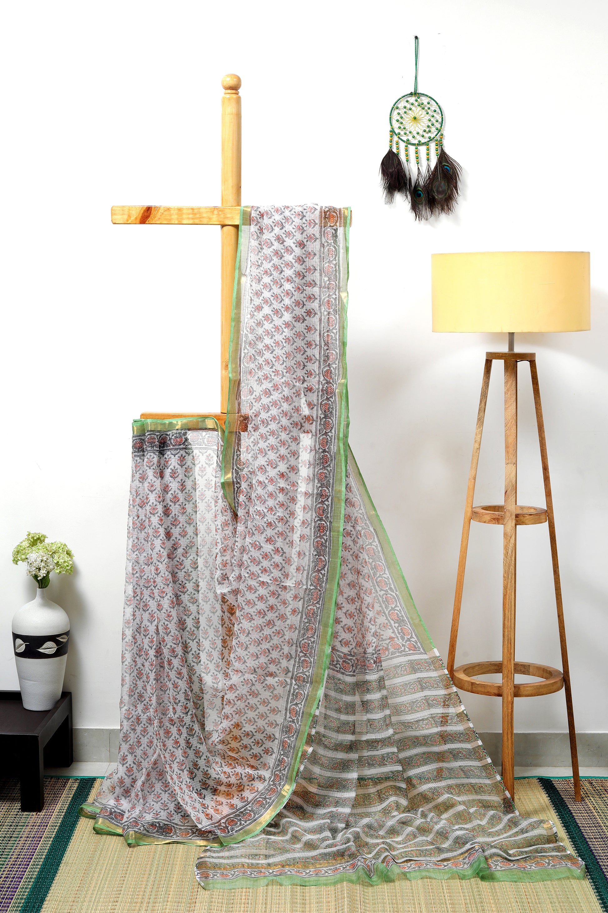 Kota doria Sanganeri - with off white body and small peach floral prints and green zari