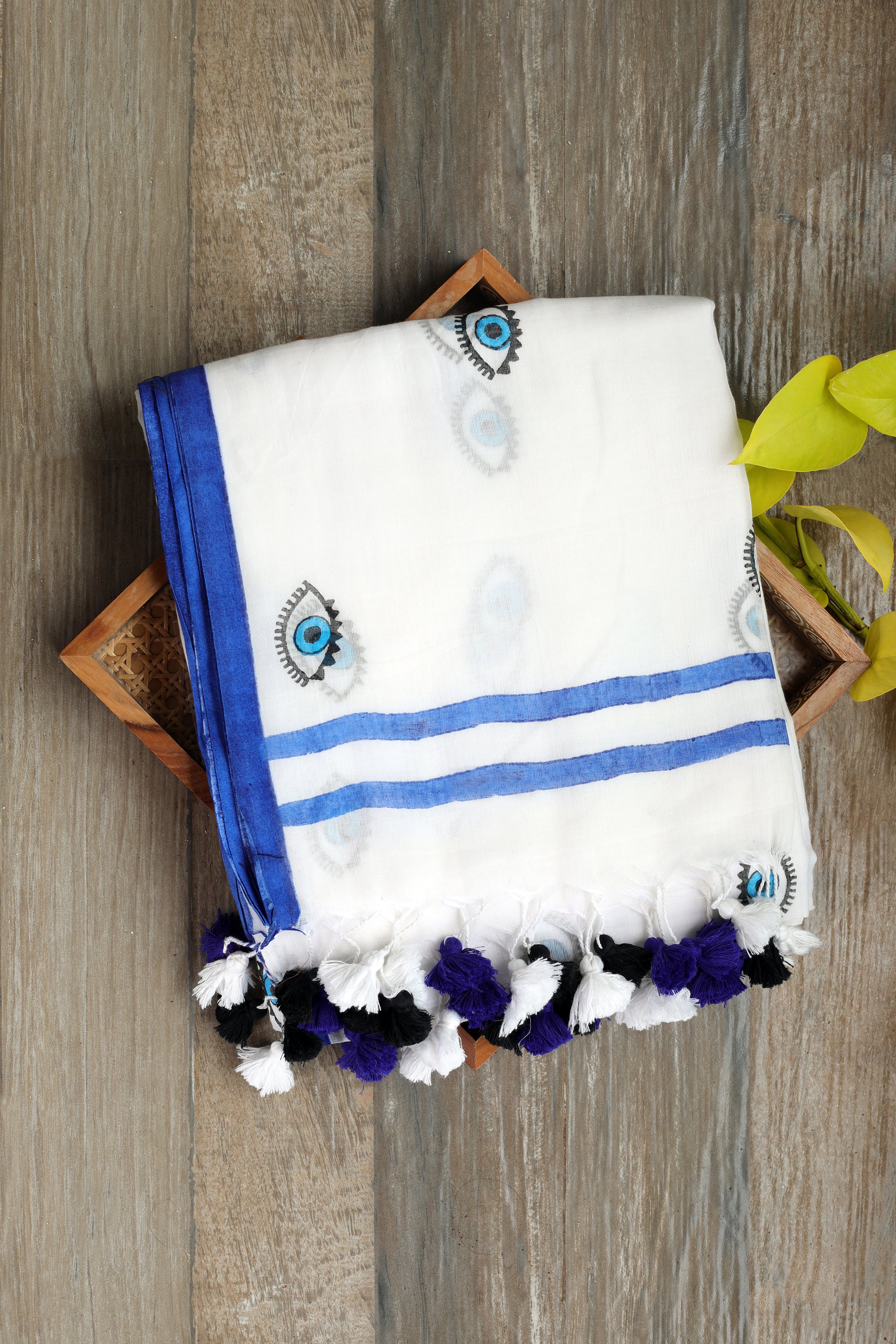 Mul Cotton - milky white with quirky evil eye prints