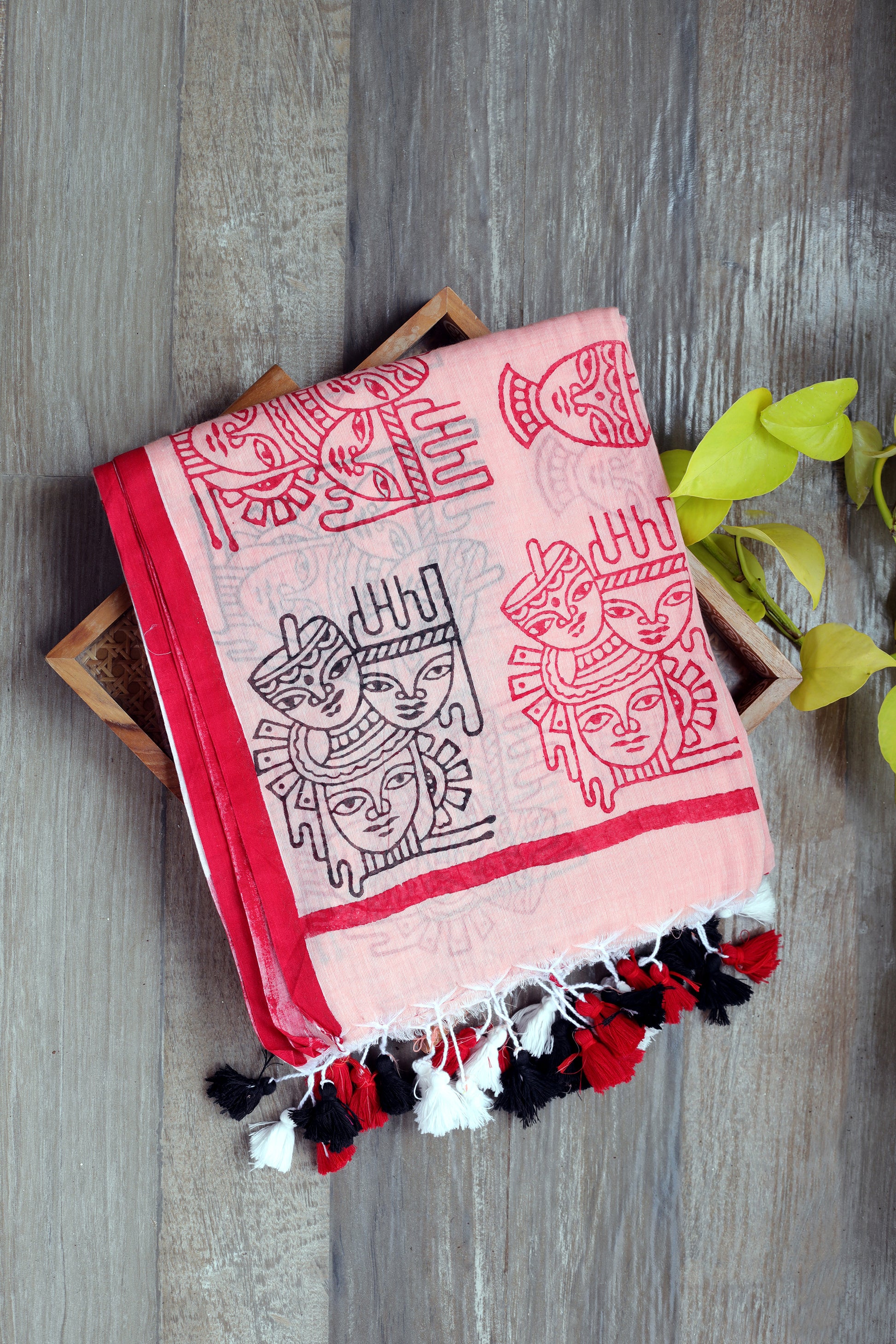 Mul Cotton - peach with tribal inspired prints in red and black with multicolored tassels