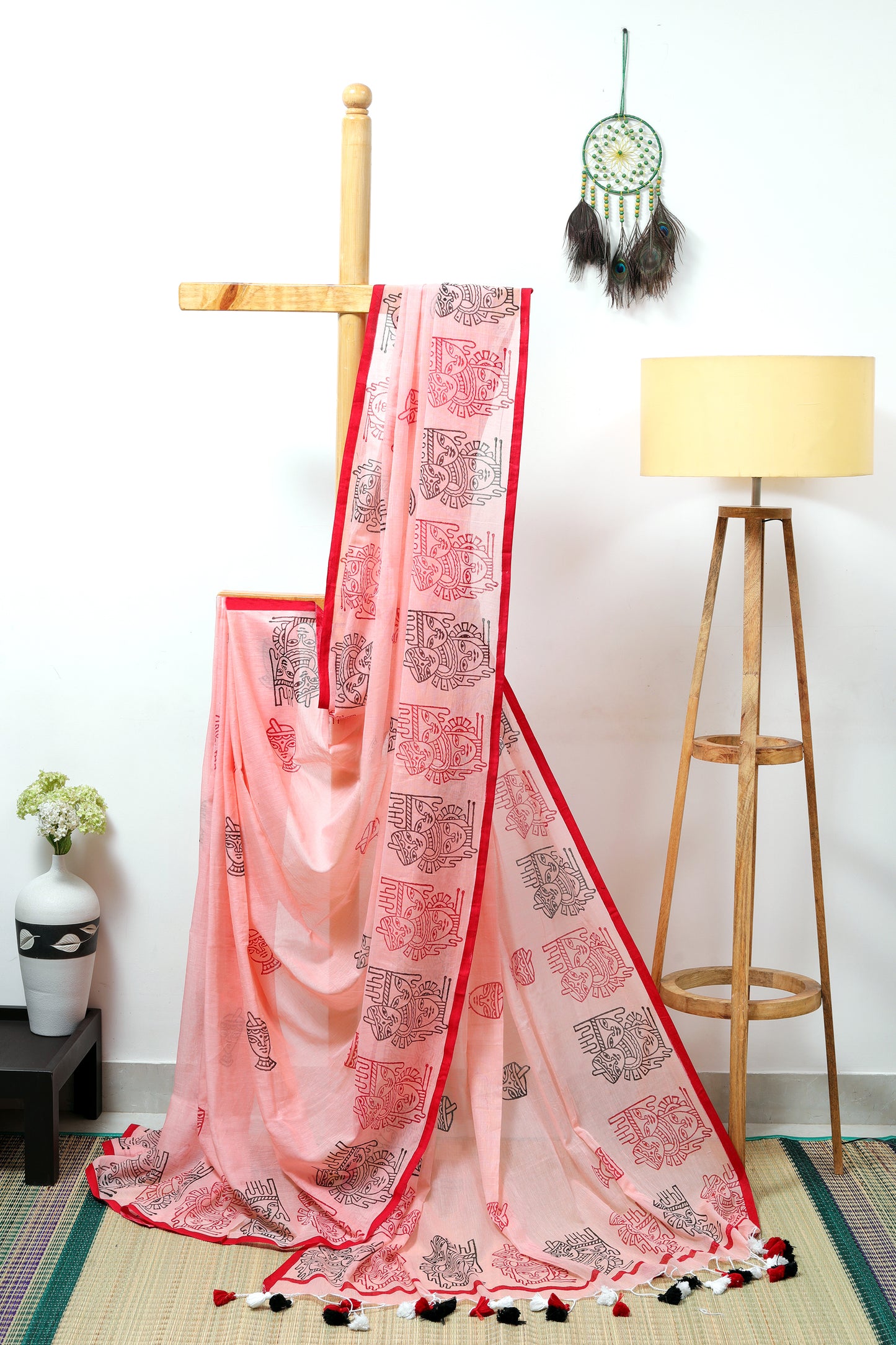 Mul Cotton - peach with tribal inspired prints in red and black with multicolored tassels