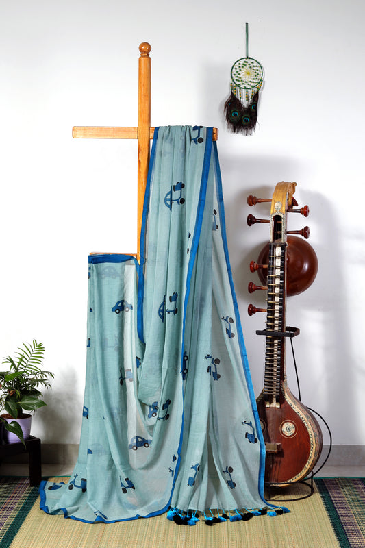 Mul cotton - pastel blue with dark blue car and scooter prints with multicolored  tassels