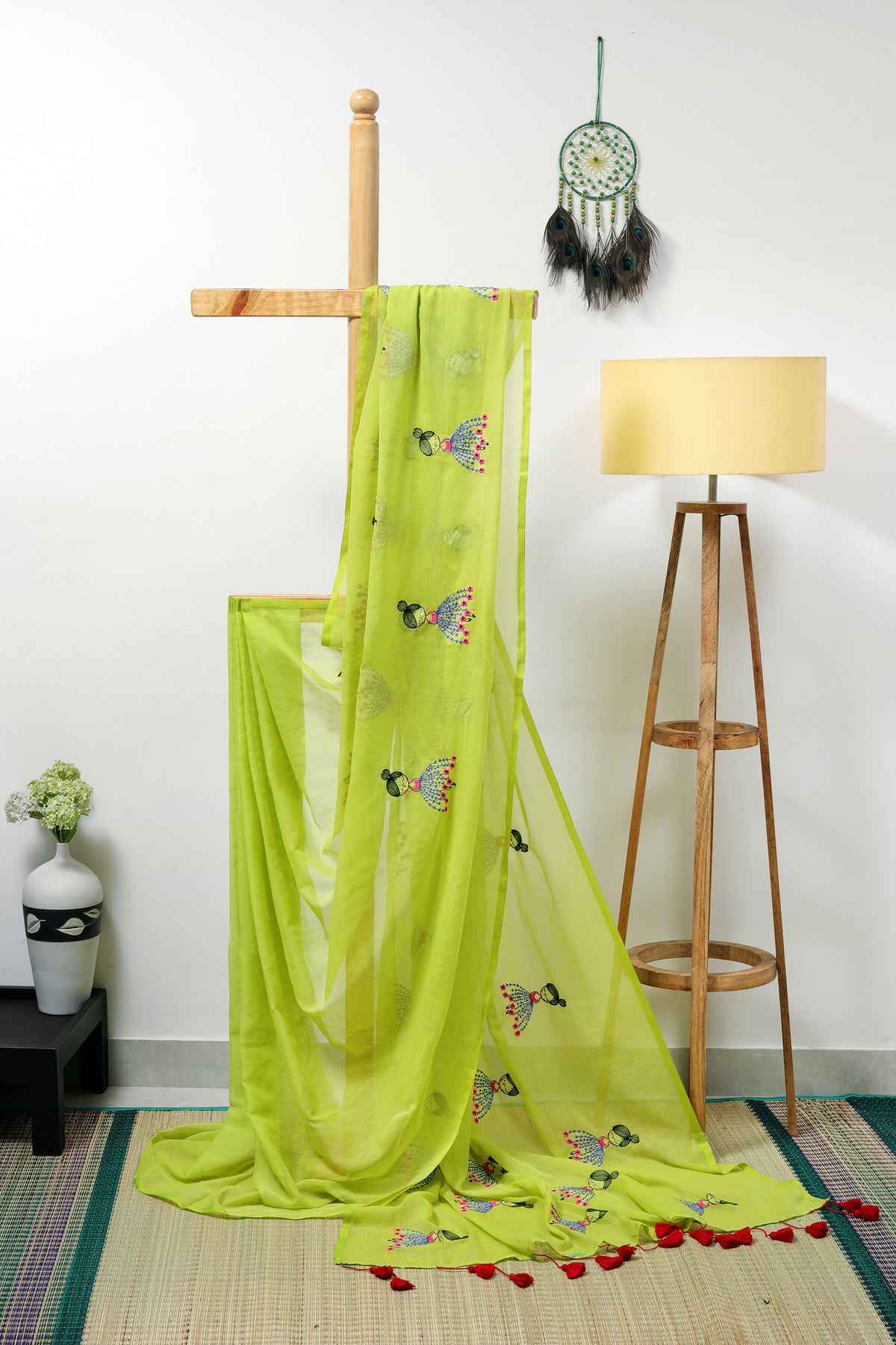 Mul cotton Embroidery - light green saree with doll embroidery and red tassels