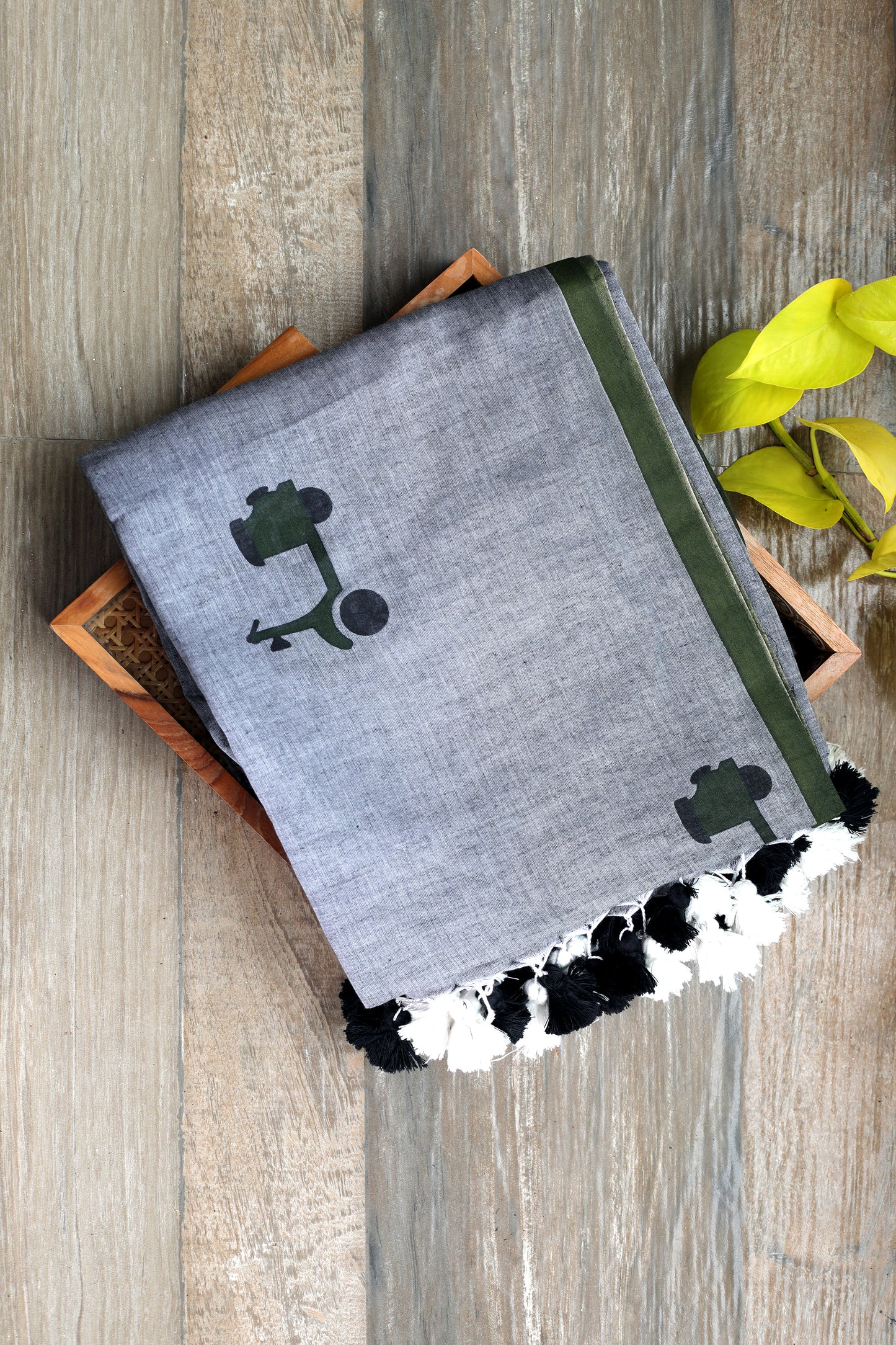Mul cotton -  grey with green  scooter and car prints with black and white tassles