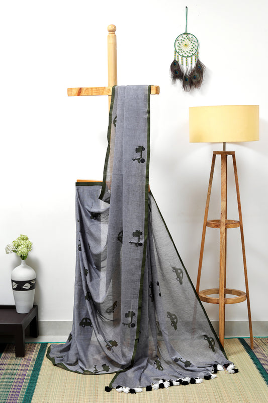 Mul cotton -  grey with green  scooter and car prints with black and white tassles