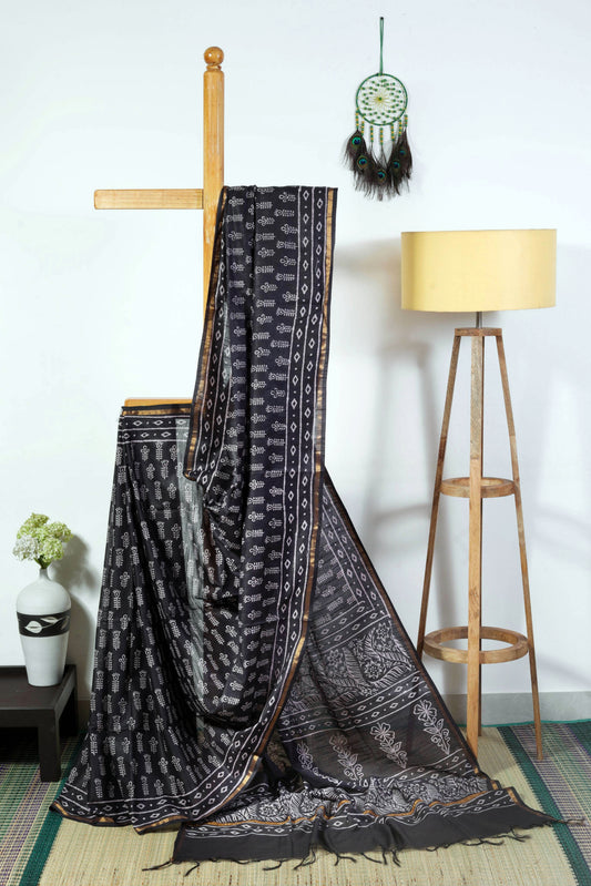 Silk blend black body with greyish white block prints with zari