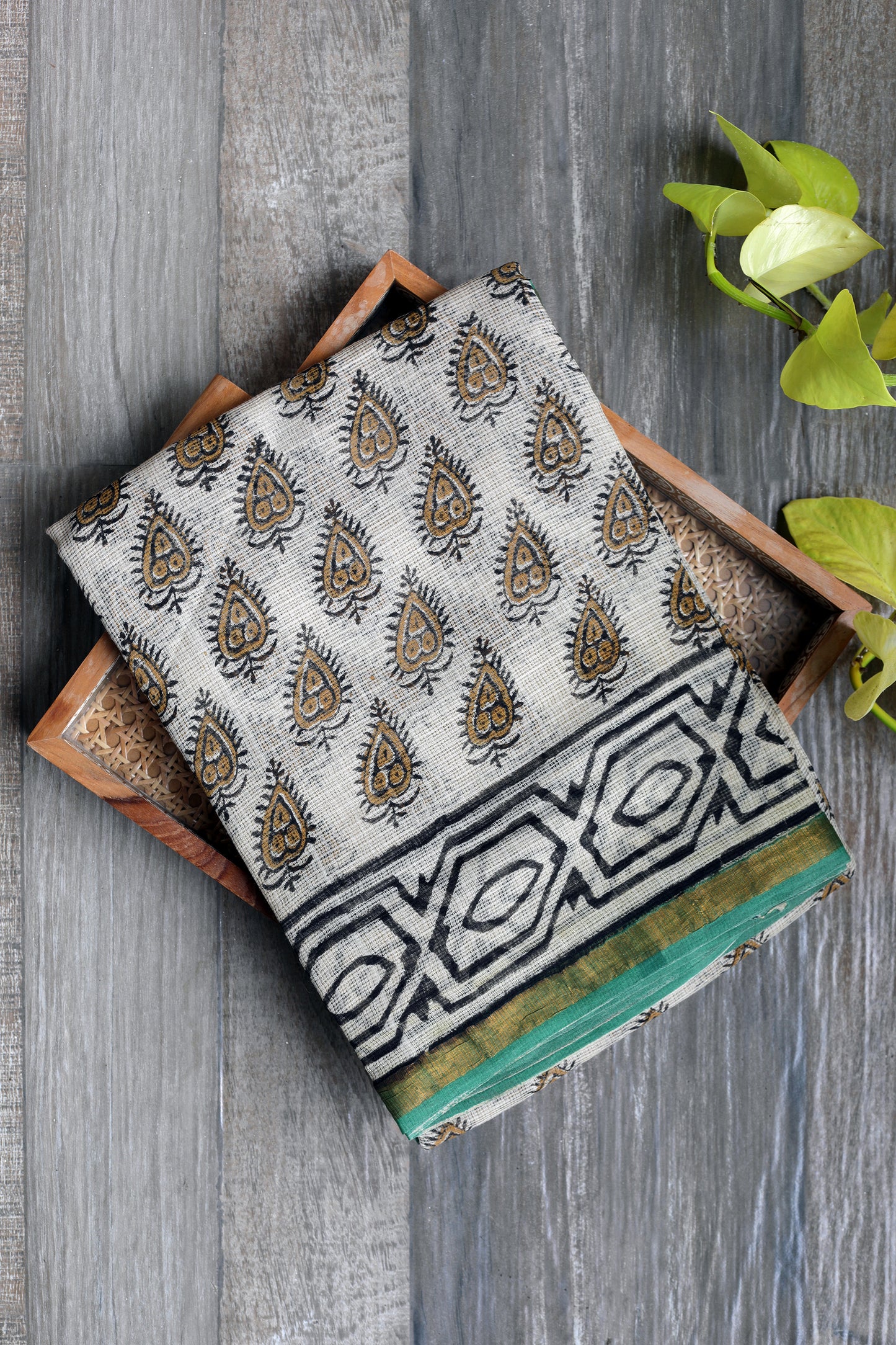 Kota doria Bagru - beige with mustard black leaf like prints and black border with green zari
