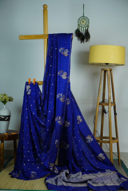 Semi silk - Bright blue with  self patterned border and gold zari full view