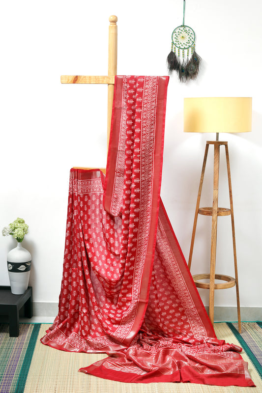 art silk maheshwari - maroon body with cream leaf block prints with a zari border